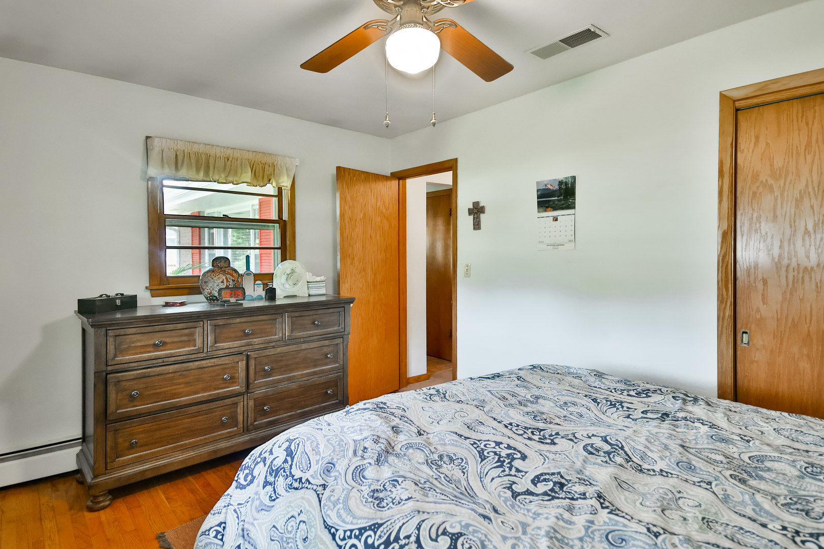3307 Ruth Street Rockford, IL 61103 - Photo 17 of 28 a bedroom with a bed and a dresser