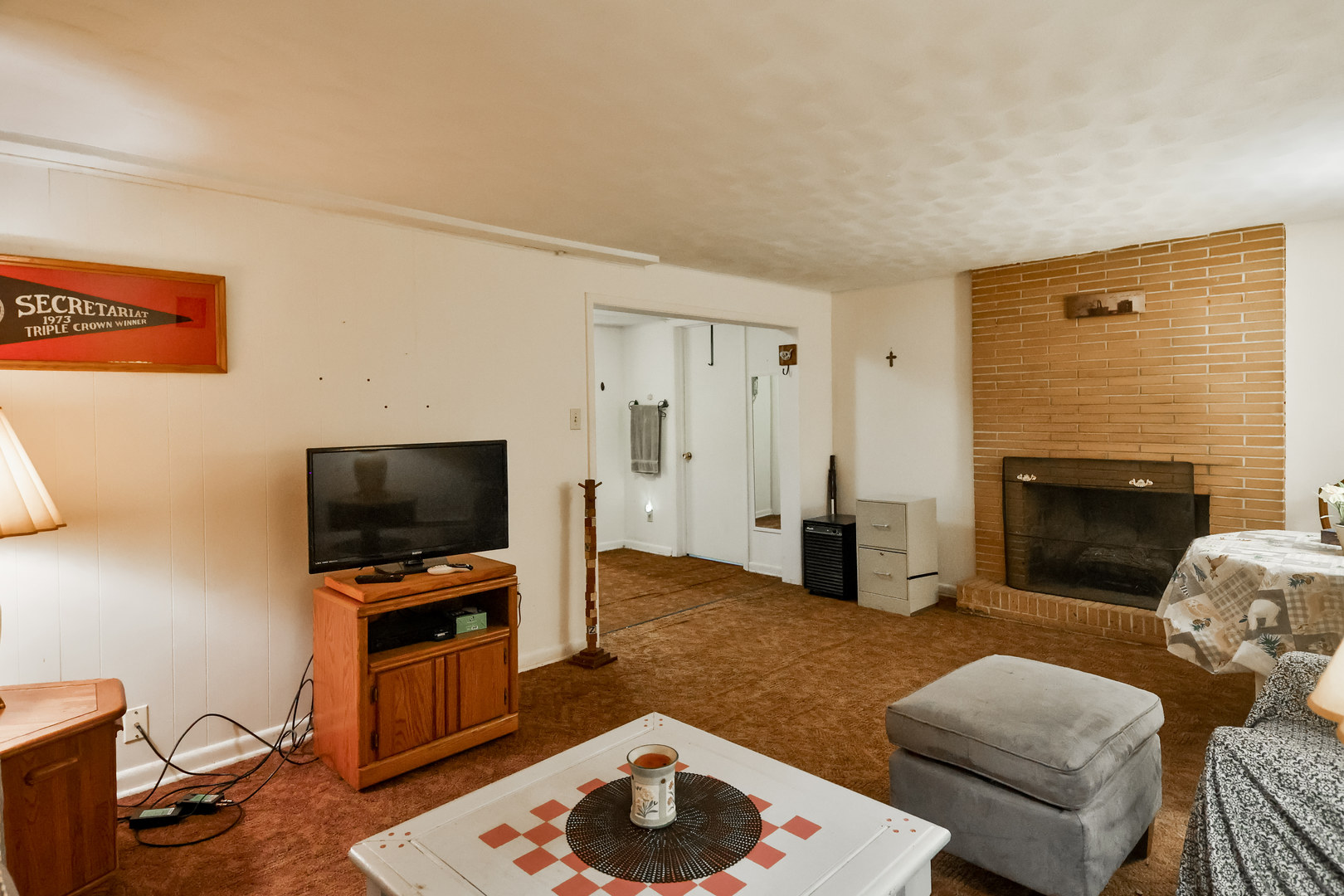 3307 Ruth Street Rockford, IL 61103 - Photo 18 of 28 a living room with furniture and a fireplace or television
