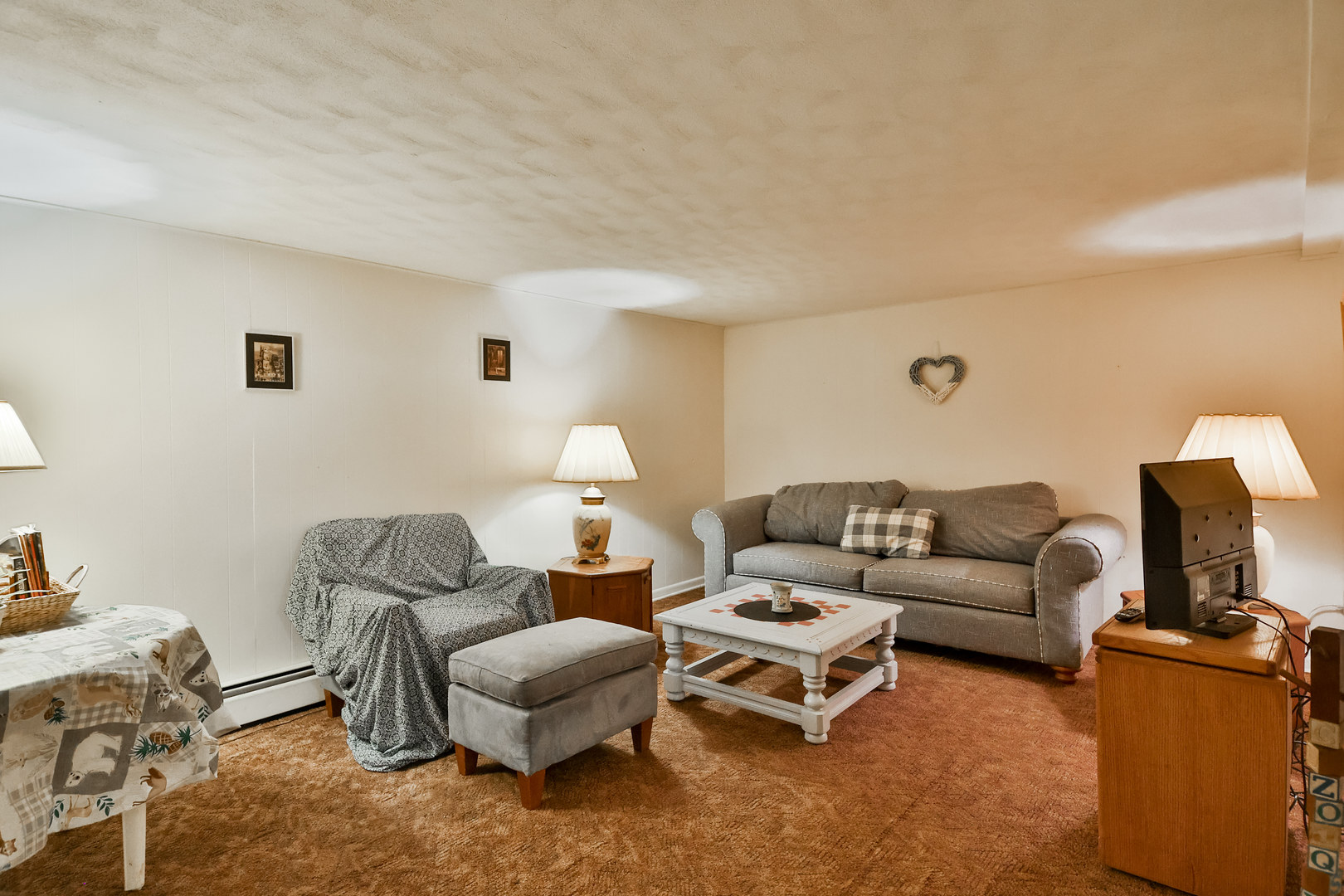 3307 Ruth Street Rockford, IL 61103 - Photo 19 of 28 a living room with furniture and a lamp
