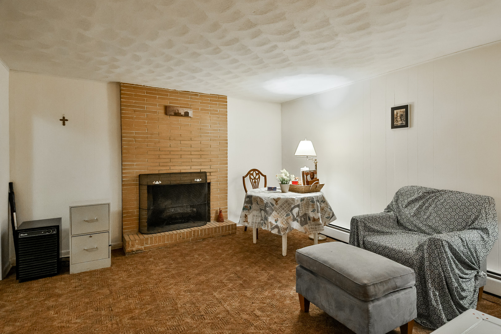 3307 Ruth Street Rockford, IL 61103 - Photo 20 of 28 a living room with furniture and a fireplace