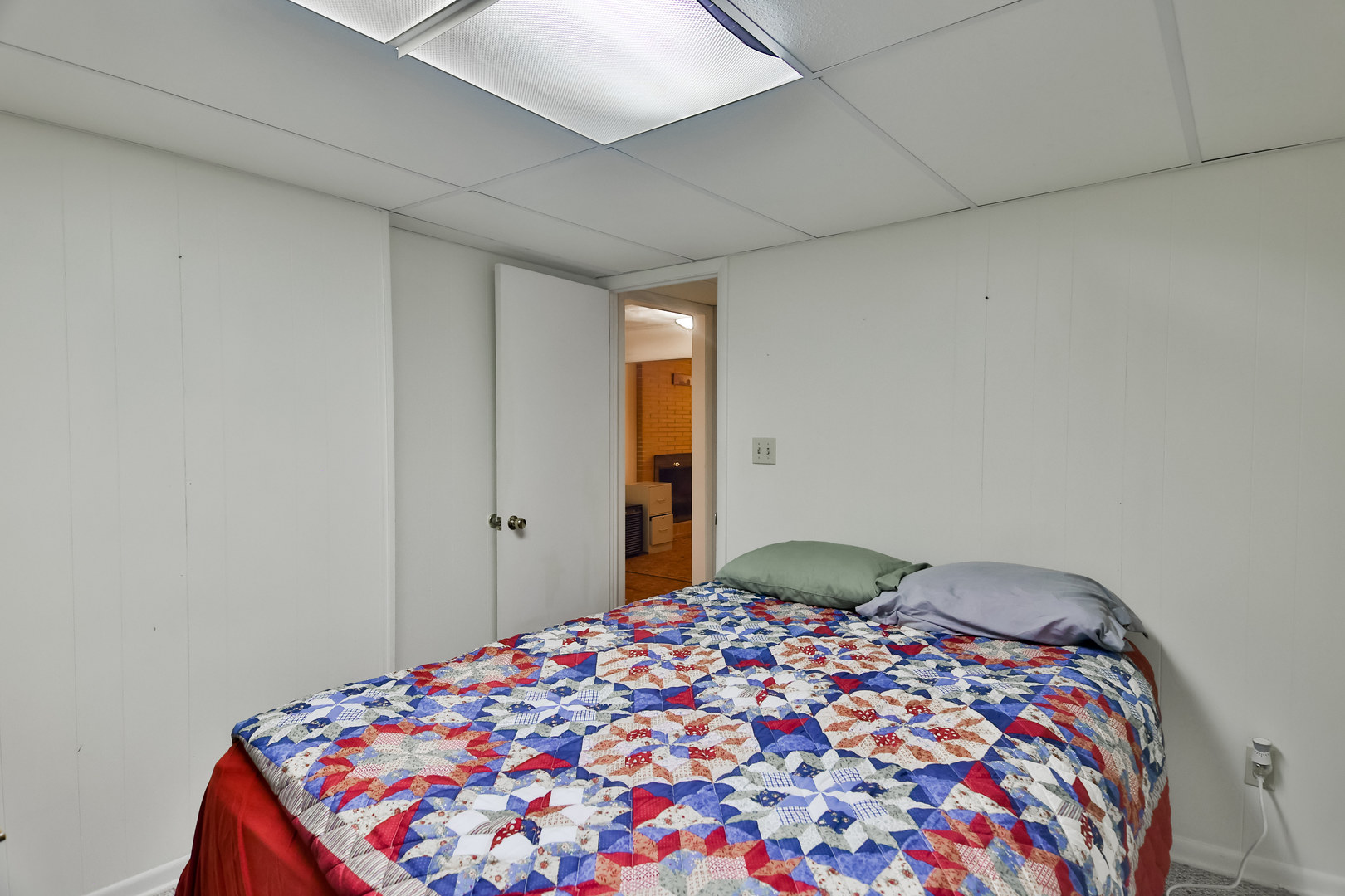 3307 Ruth Street Rockford, IL 61103 - Photo 21 of 28 a bedroom with a bed and a lamp