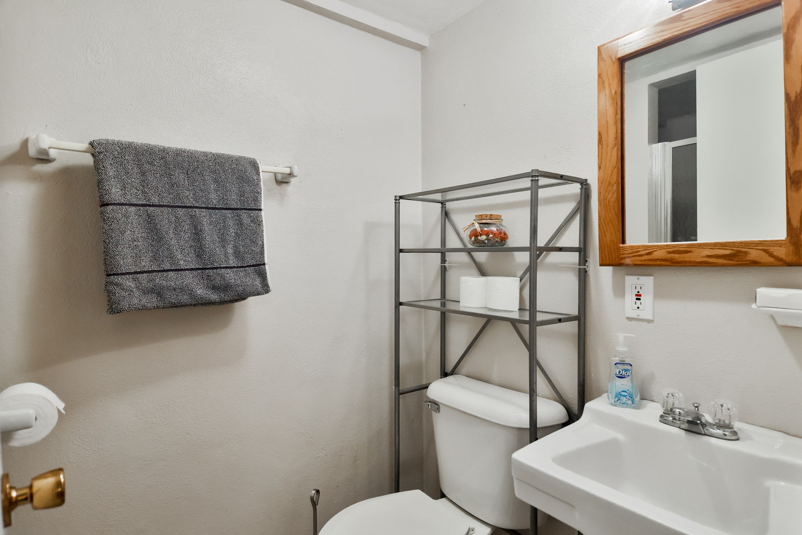 3307 Ruth Street Rockford, IL 61103 - Photo 22 of 28 a bathroom with a sink a toilet and mirror