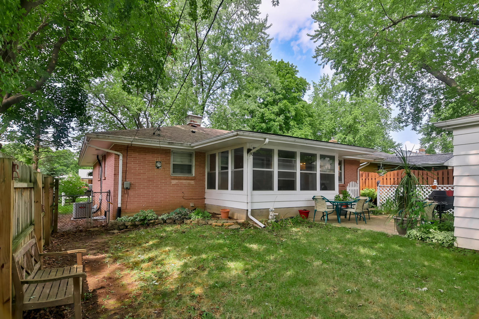 3307 Ruth Street Rockford, IL 61103 - Photo 25 of 28 a view of a house with a yard and sitting area