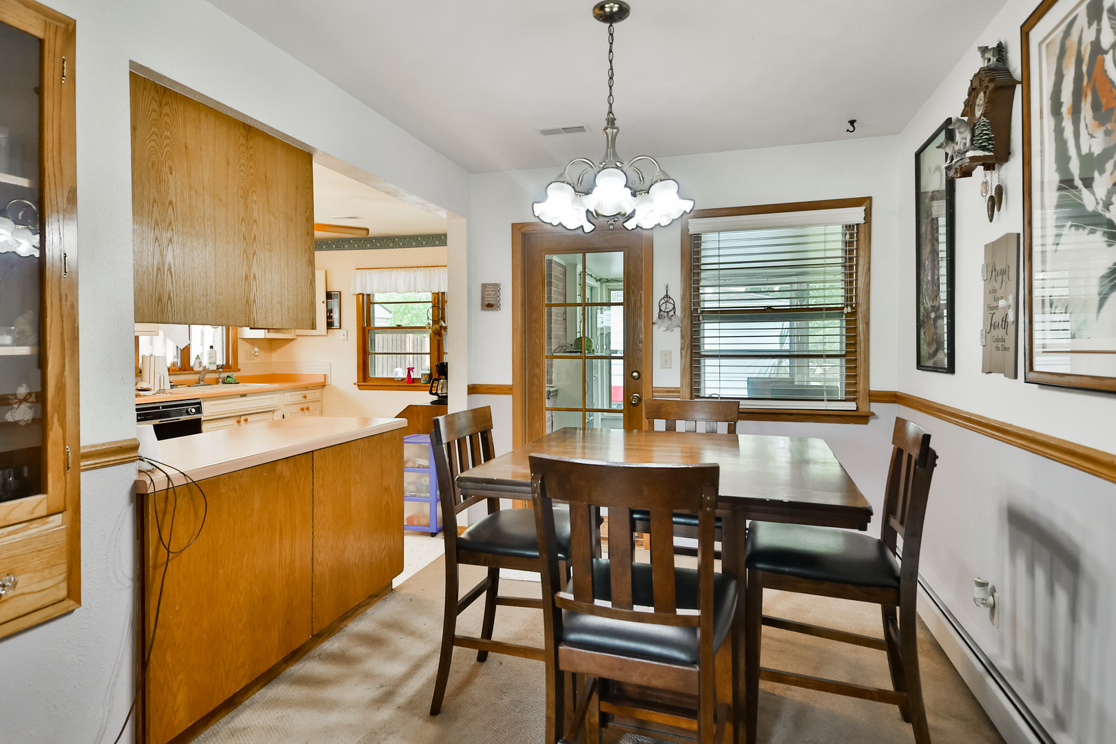 3307 Ruth Street Rockford, IL 61103 - Photo 6 of 28 a view of a dining room with furniture window and outside view