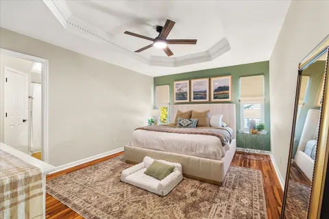 a bed room with bed and window