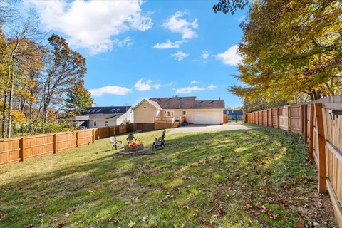 a house view with a garden space