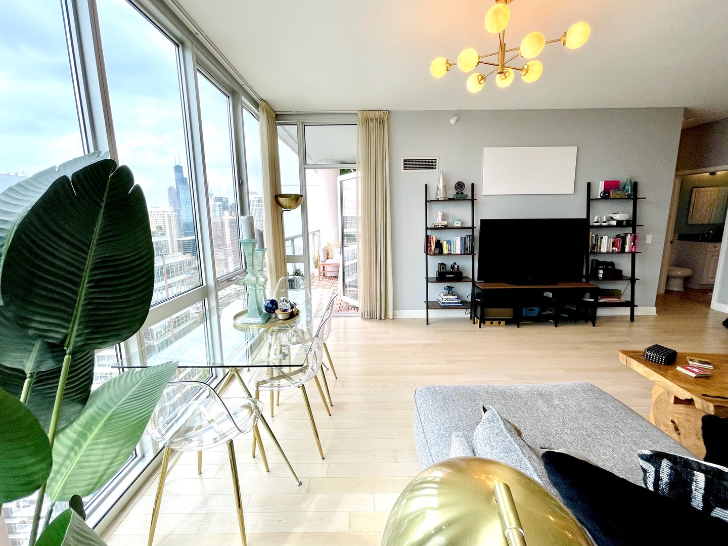 1629 South Prairie Avenue, Unit 2509 Chicago, IL 60616 - Photo 8 of 38 a living room with furniture and a flat screen tv