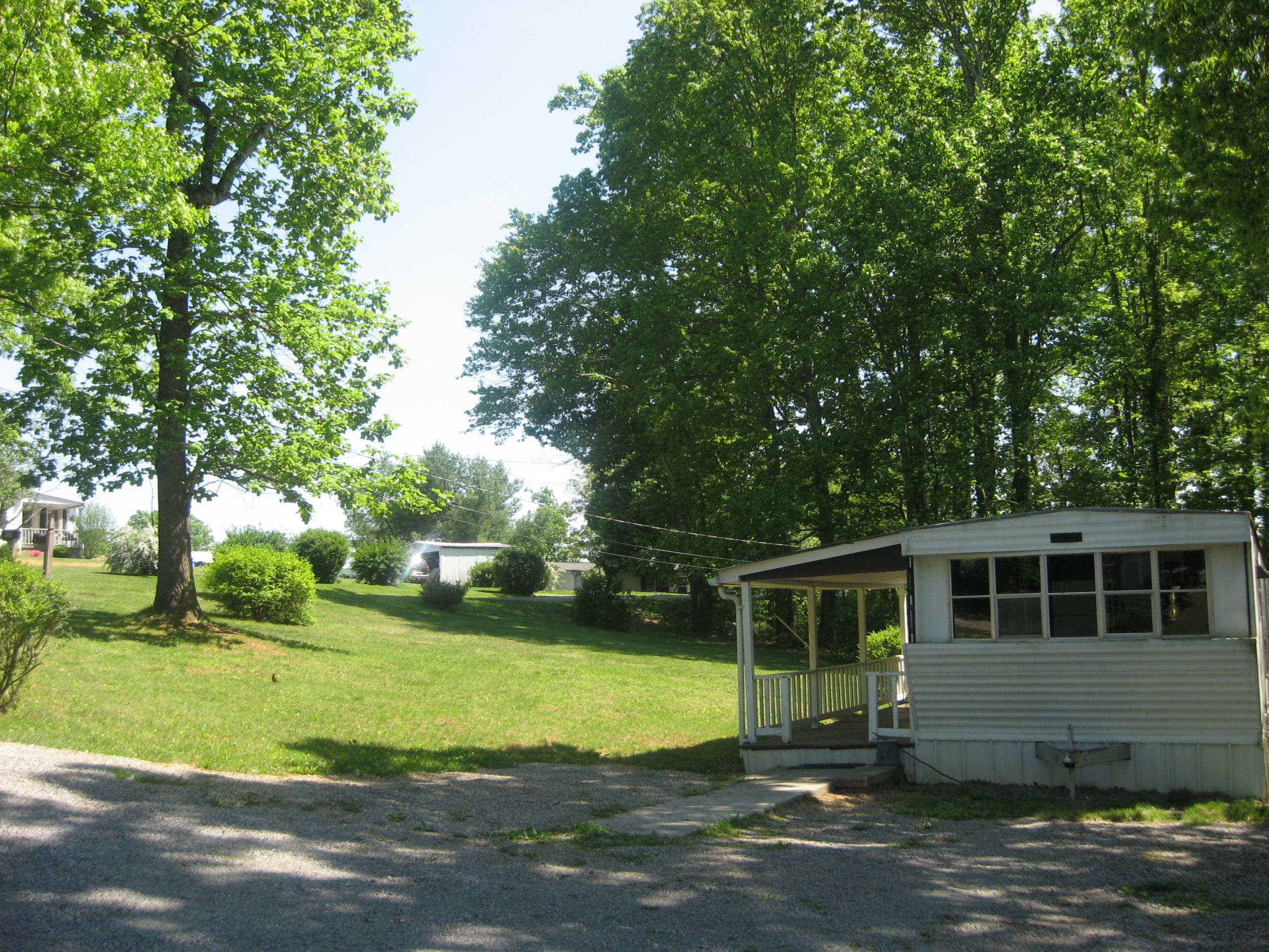 2089 Morgans Mill Road Goodview, VA 24095 - Photo 3 of 9 a view of a house with a yard