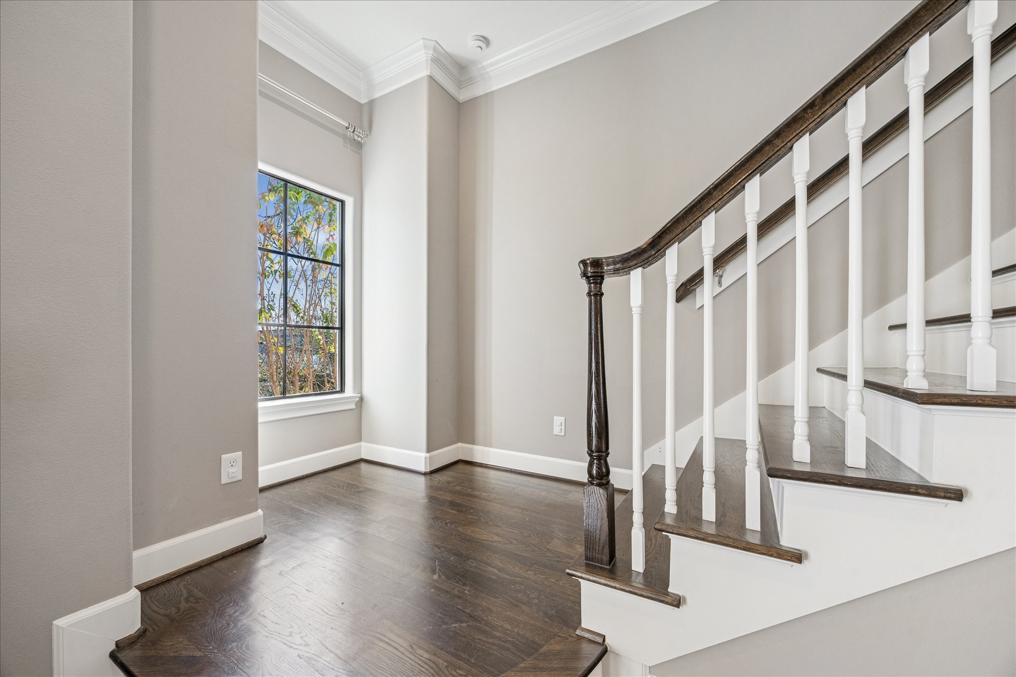 2210 Converse Street Houston, TX 77006 - Photo 15 of 35 a view of entryway with wooden floor and stairs