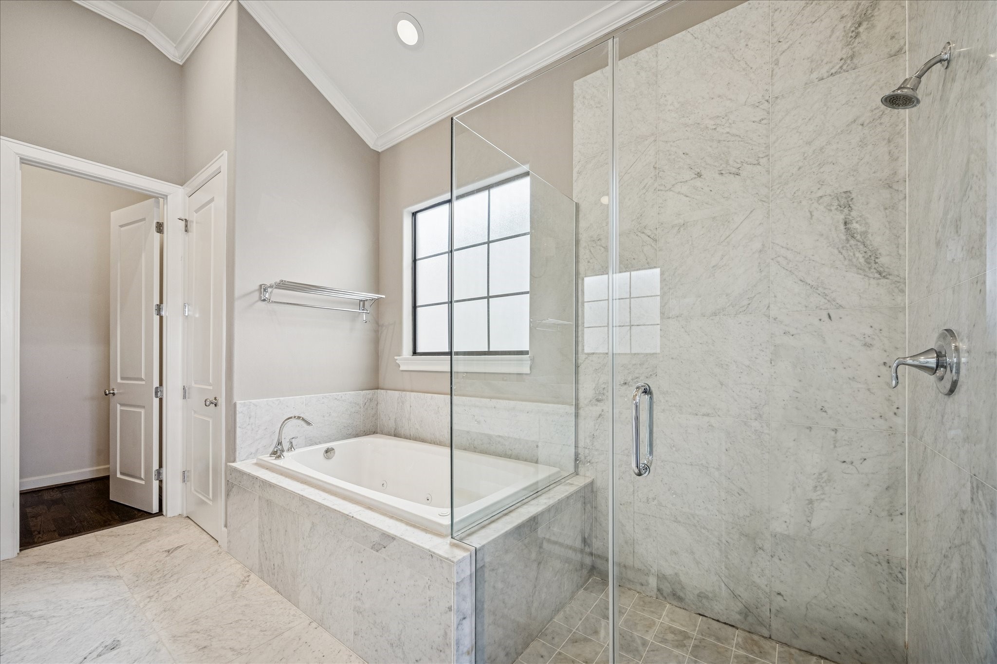 2210 Converse Street Houston, TX 77006 - Photo 21 of 35 a white bath tub sitting next to a shower