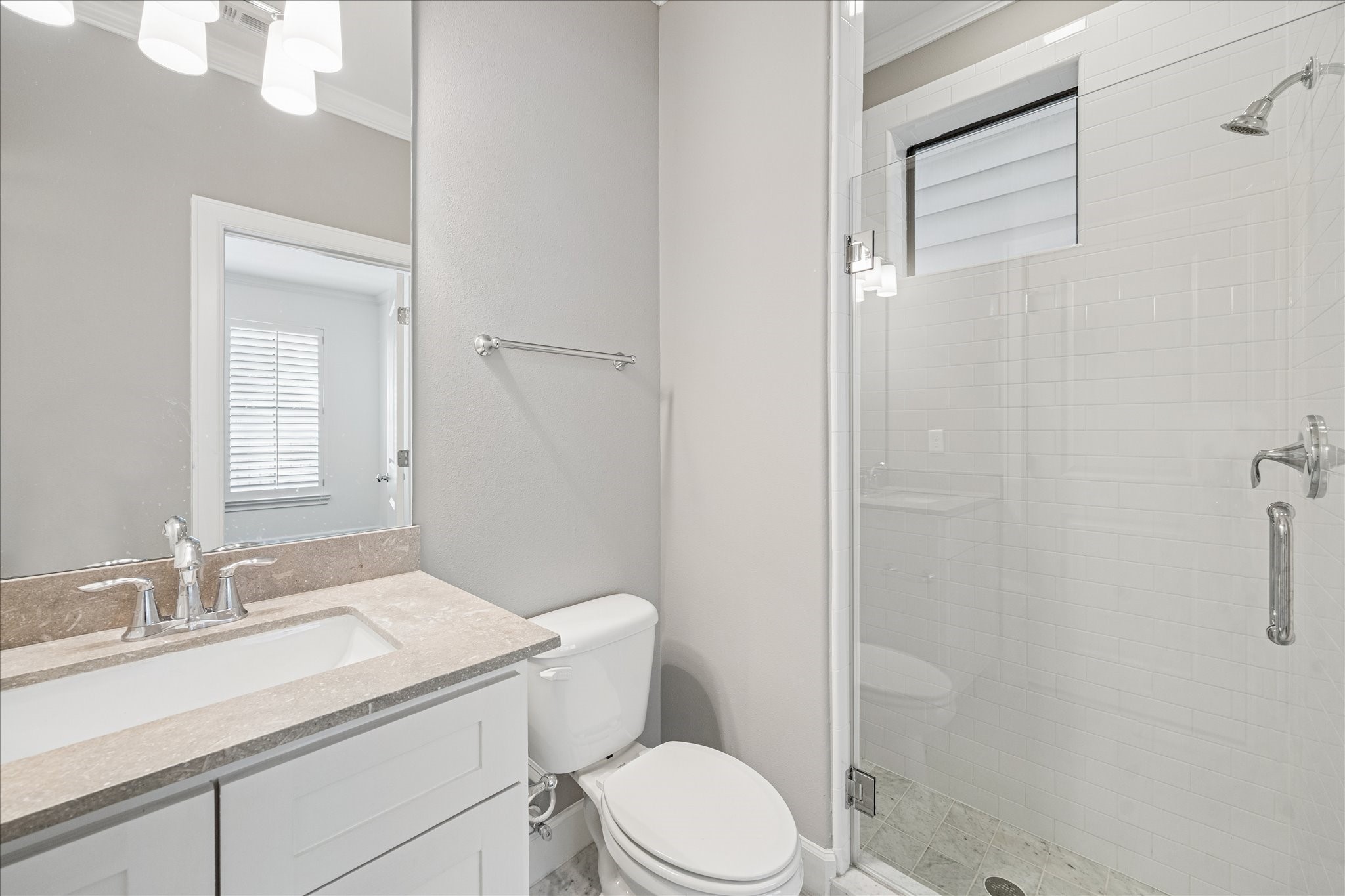 2210 Converse Street Houston, TX 77006 - Photo 25 of 35 a bathroom with a granite countertop sink toilet and shower