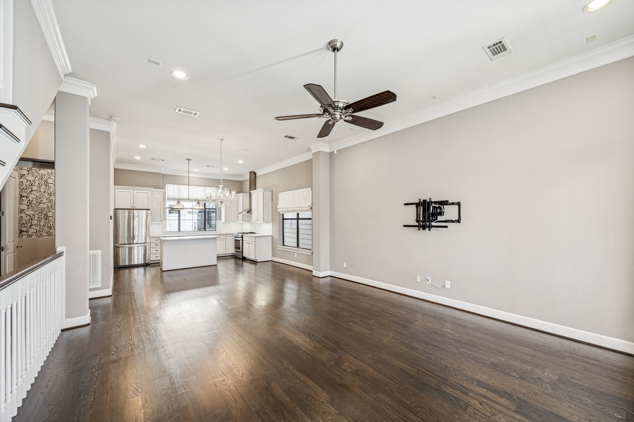 2210 Converse Street Houston, TX 77006 - Photo 33 of 35 a view of an empty room with a window and wooden floor