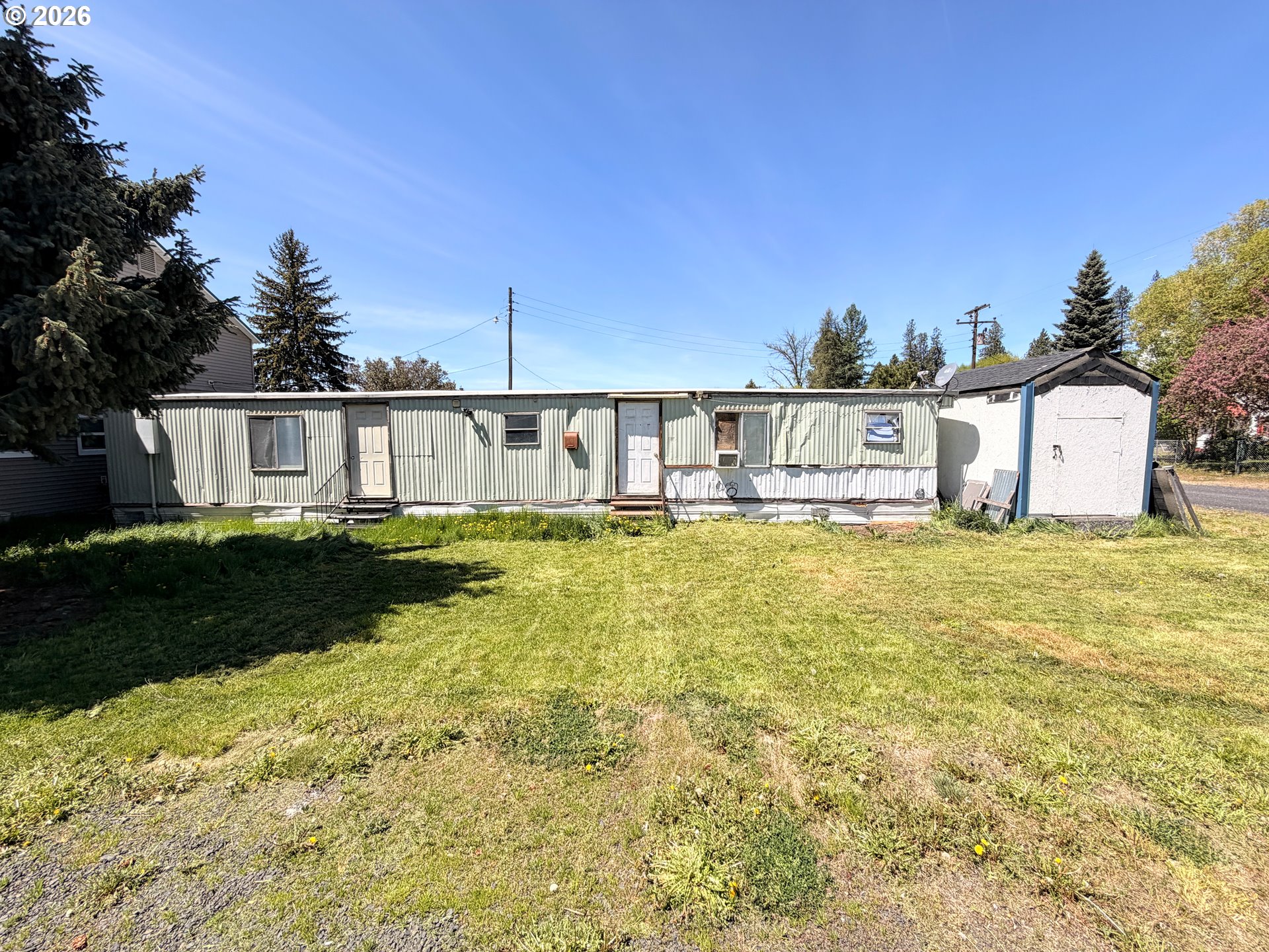 101 Main Street Ukiah, OR 97880 - Photo 17 of 17 a view of a house with a big yard