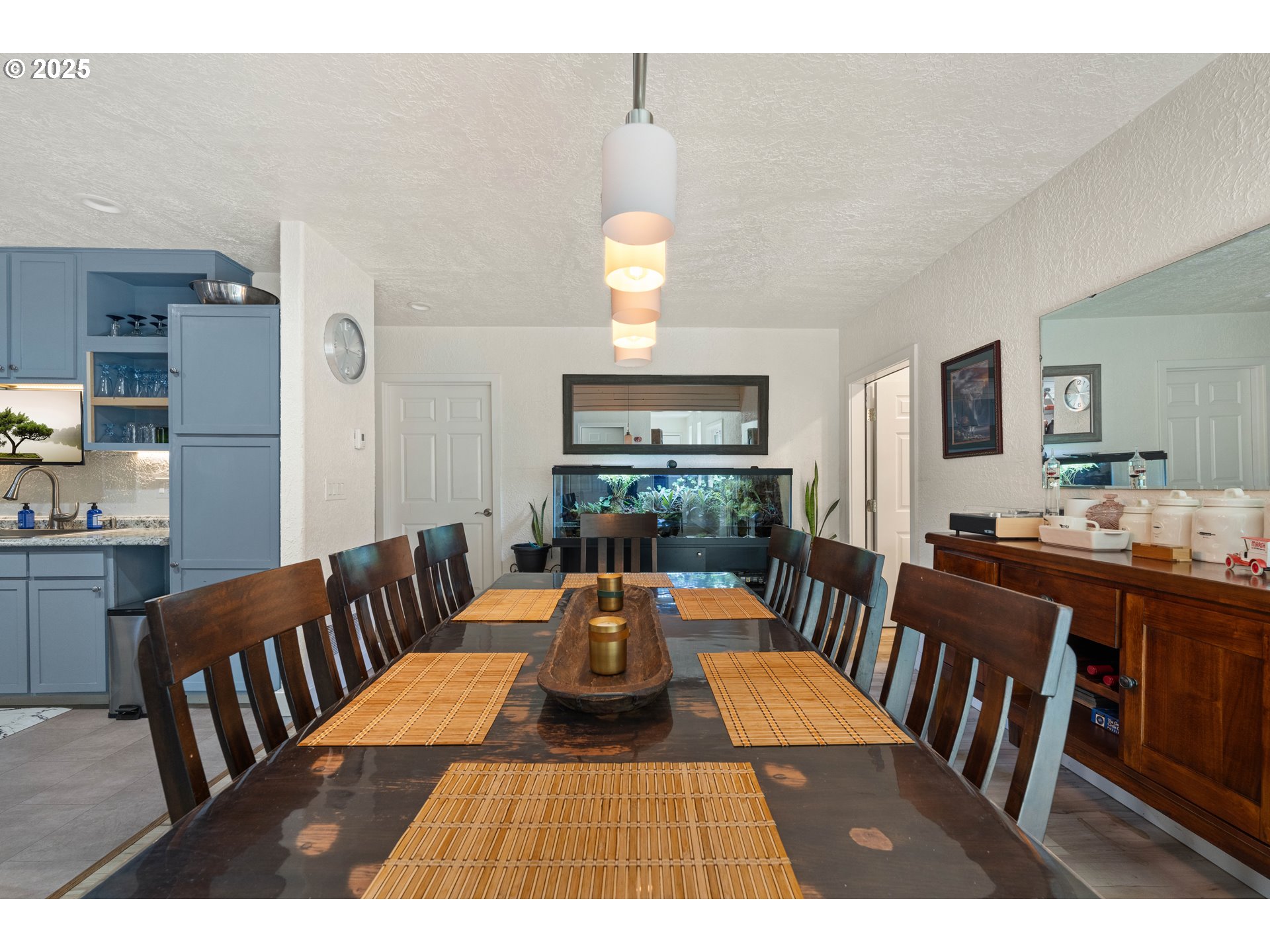 1935 17th Street North Bend, OR 97459 - Photo 11 of 44 a view of a dining room with furniture window and wooden floor