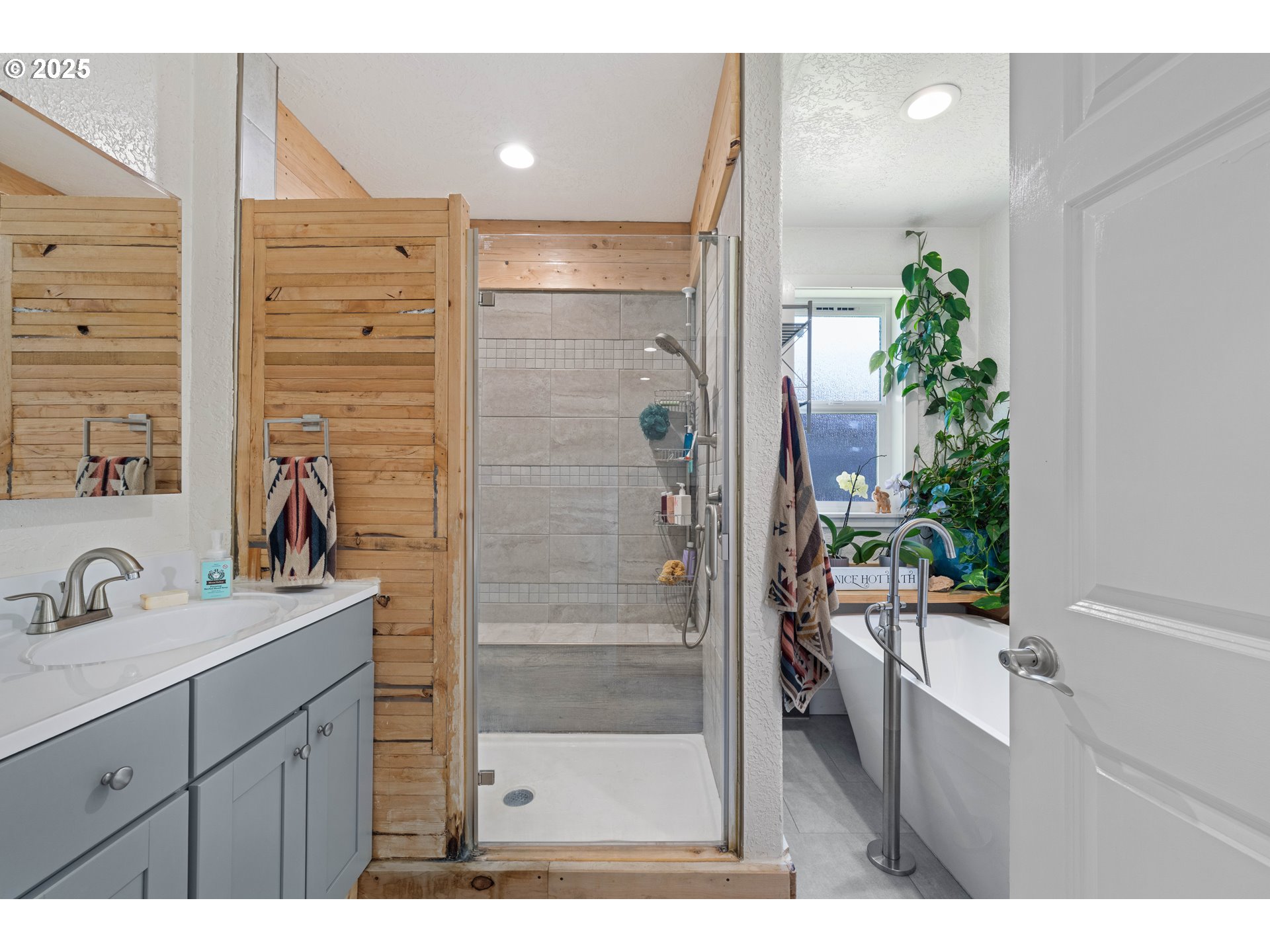 1935 17th Street North Bend, OR 97459 - Photo 17 of 44 a bathroom with a sink and a mirror