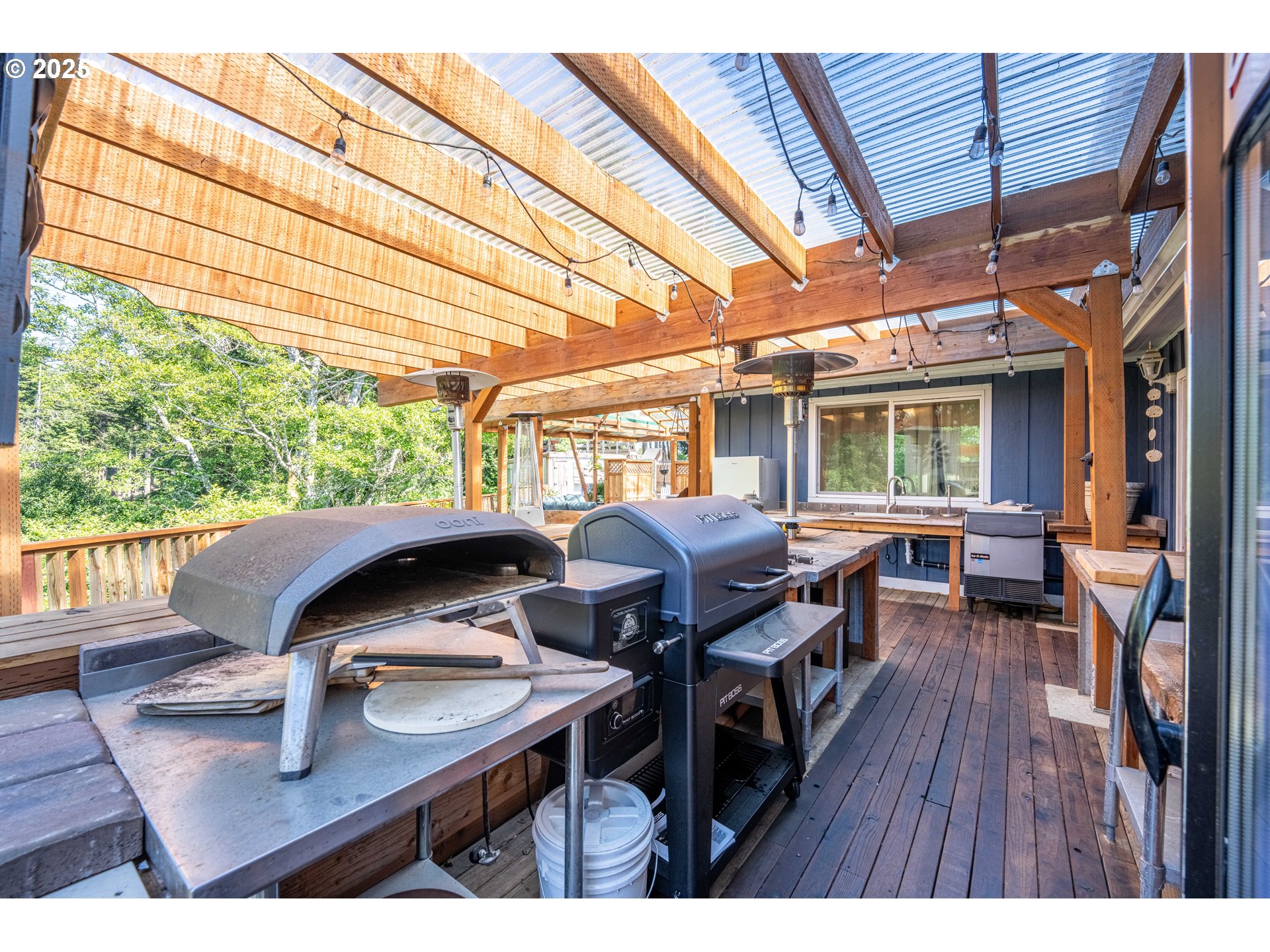 1935 17th Street North Bend, OR 97459 - Photo 25 of 44 a view of a patio with table and chairs
