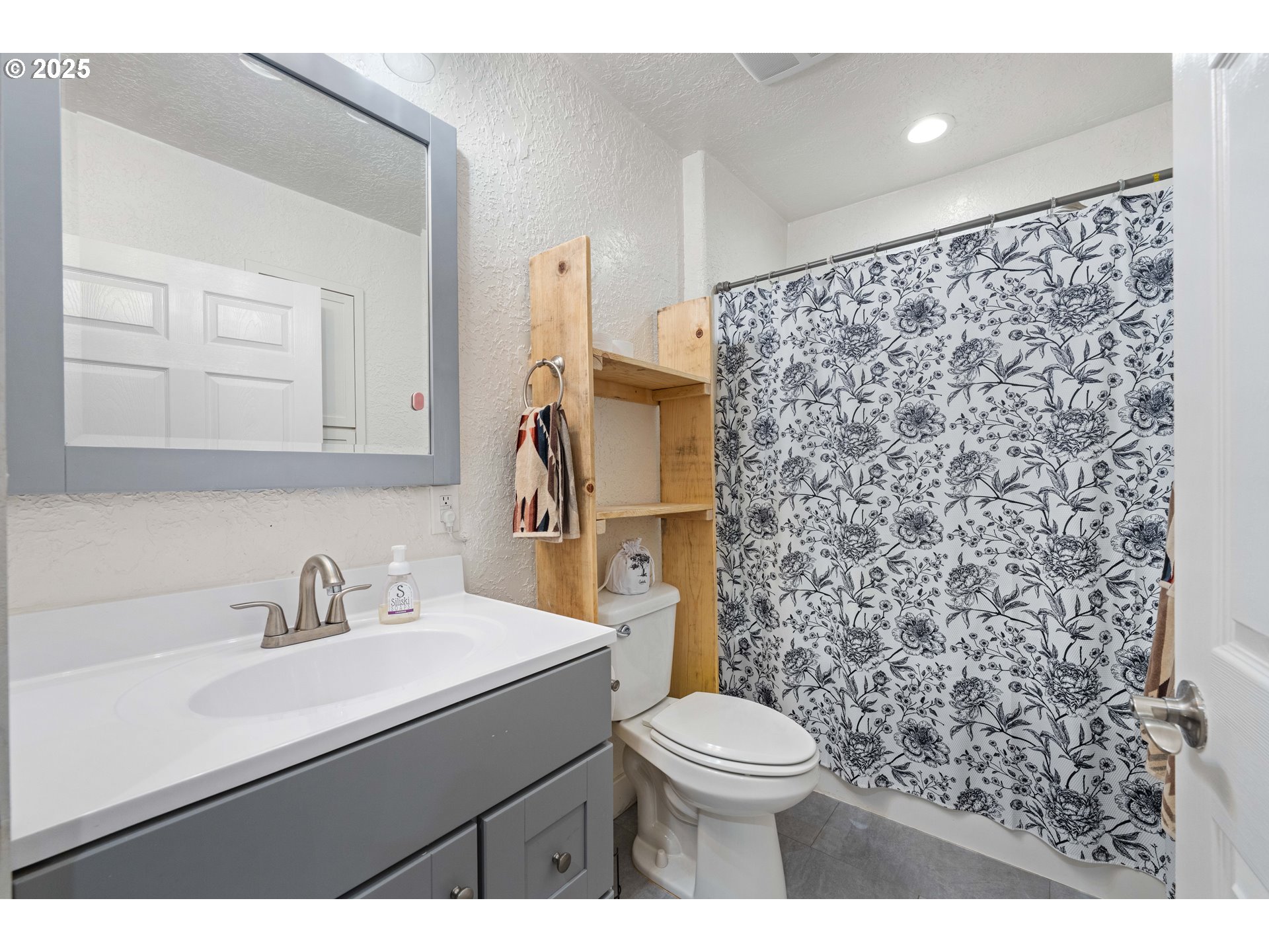 1935 17th Street North Bend, OR 97459 - Photo 26 of 44 a bathroom with a sink toilet and shower