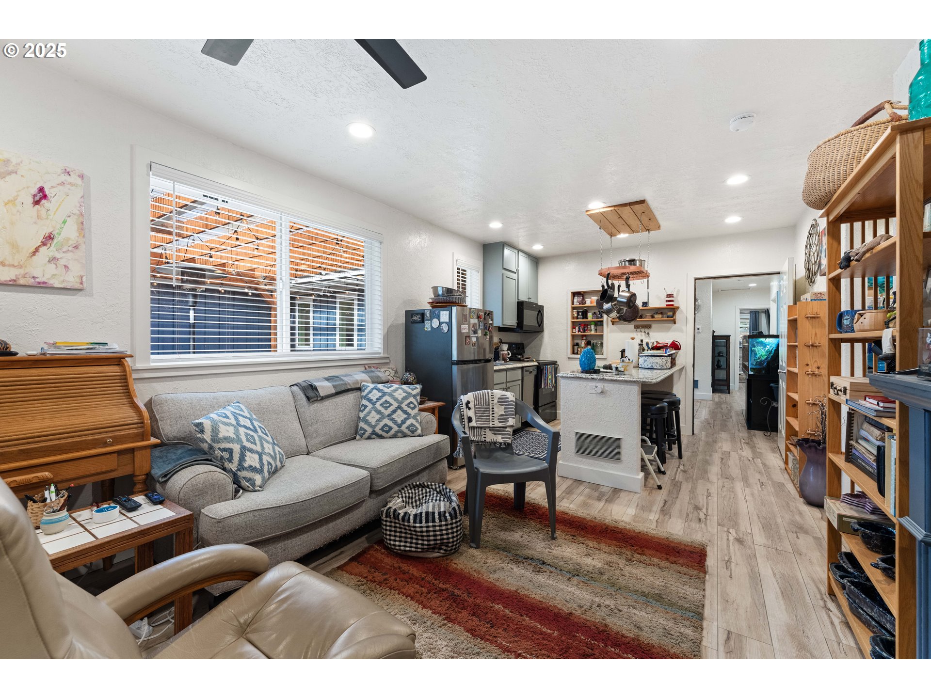 1935 17th Street North Bend, OR 97459 - Photo 31 of 44 a living room with furniture and a large window