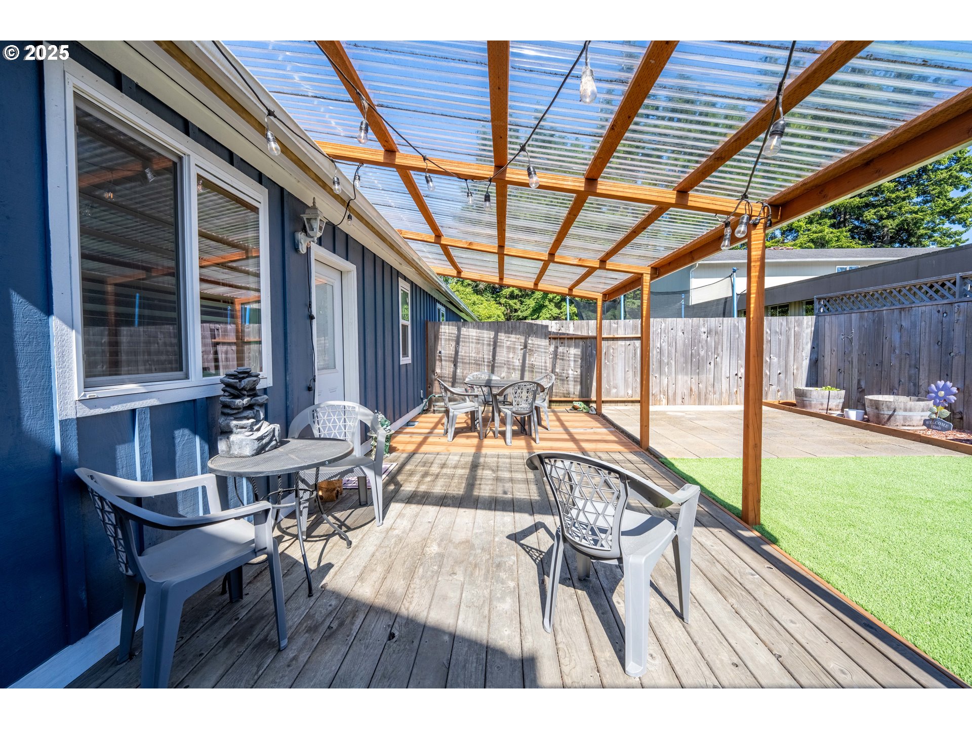 1935 17th Street North Bend, OR 97459 - Photo 40 of 44 a view of swimming pool with a patio