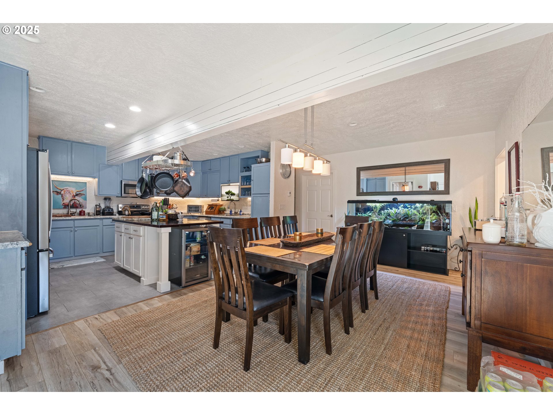 1935 17th Street North Bend, OR 97459 - Photo 4 of 44 a view of a dining room with furniture and wooden floor