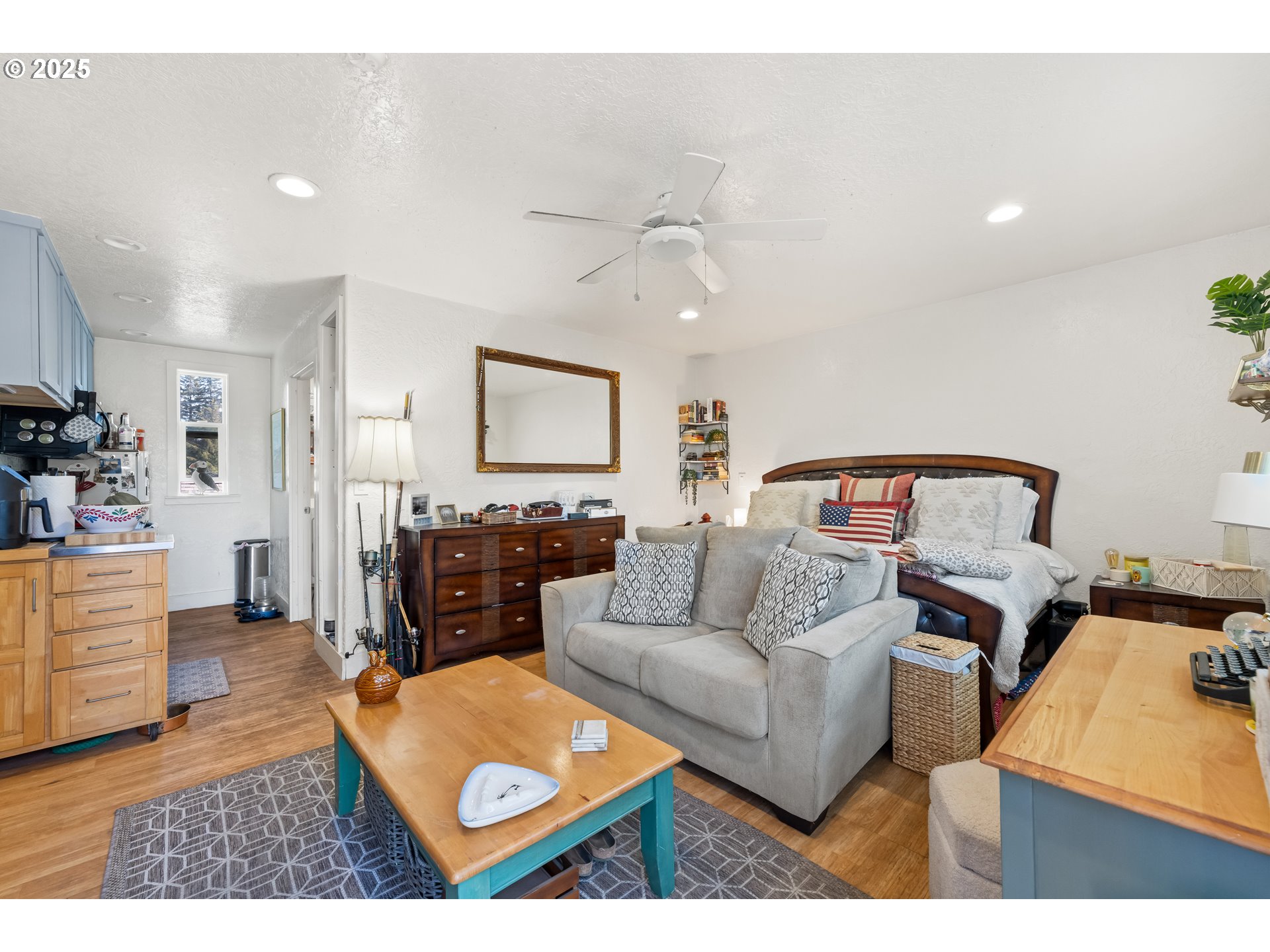 1935 17th Street North Bend, OR 97459 - Photo 41 of 44 a living room with furniture and a flat screen tv