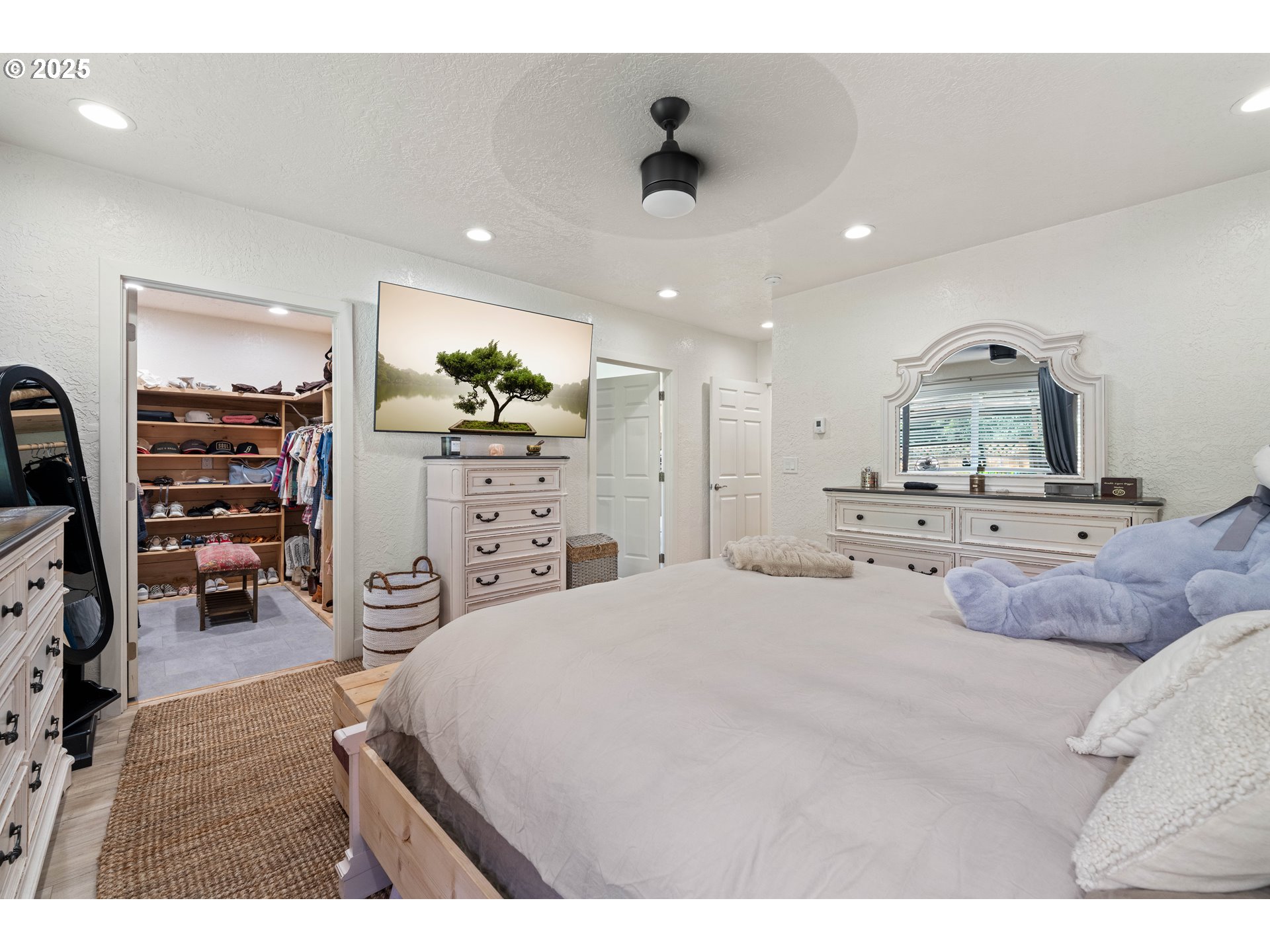 1935 17th Street North Bend, OR 97459 - Photo 10 of 44 a bedroom with furniture and a bed