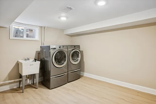 a utility room with dryer and washer