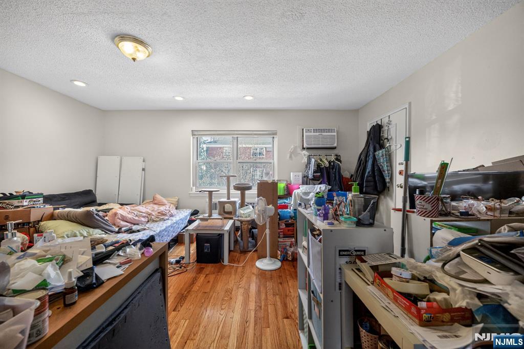 243 Johnson Avenue, Unit L4 Hackensack, NJ 07601 - Photo 13 of 25 a view of a room with gym equipment