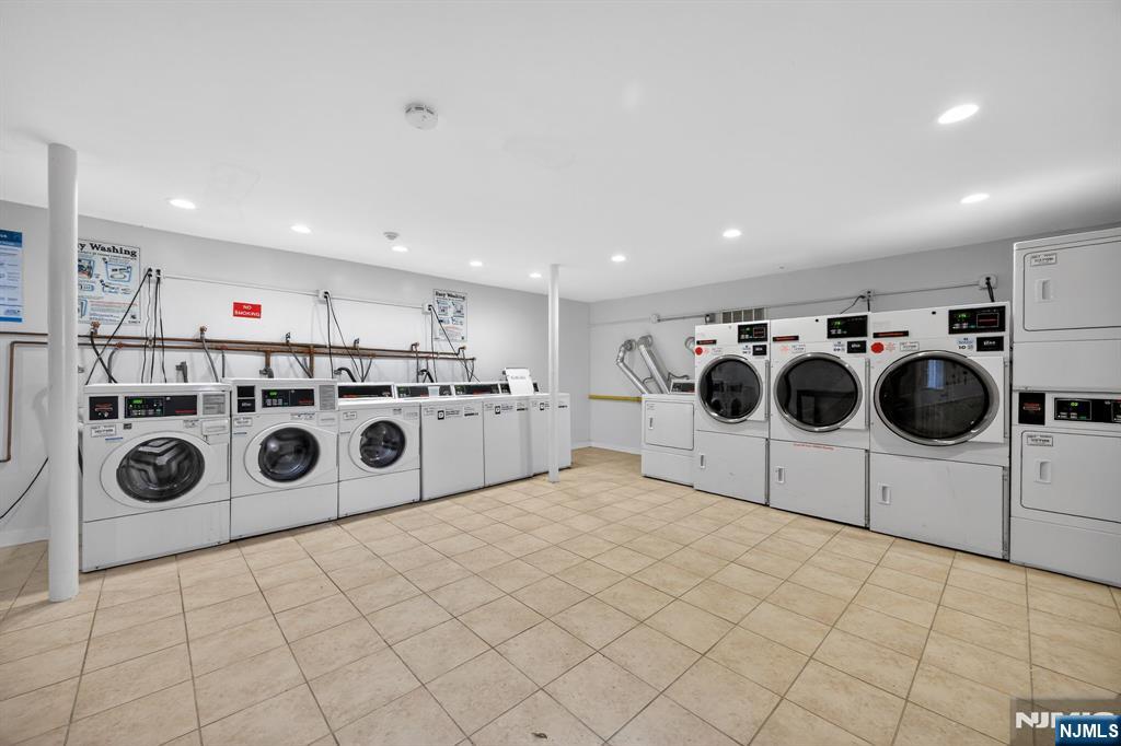 243 Johnson Avenue, Unit L4 Hackensack, NJ 07601 - Photo 20 of 25 a utility room with stainless steel appliances and cabinets