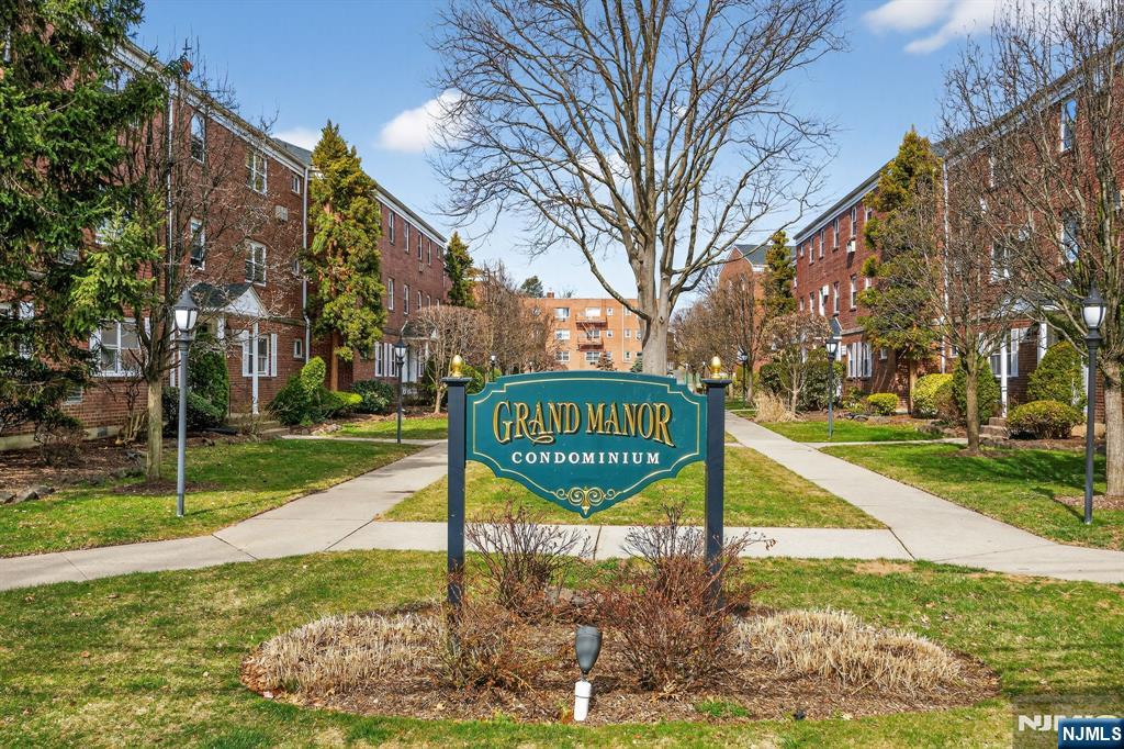 243 Johnson Avenue, Unit L4 Hackensack, NJ 07601 - Photo 2 of 25 a sign on the side of the road