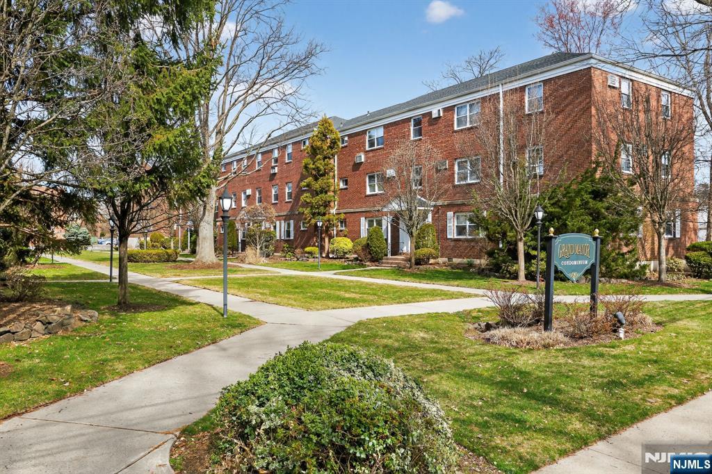 243 Johnson Avenue, Unit L4 Hackensack, NJ 07601 - Photo 23 of 25 a view of building with yard