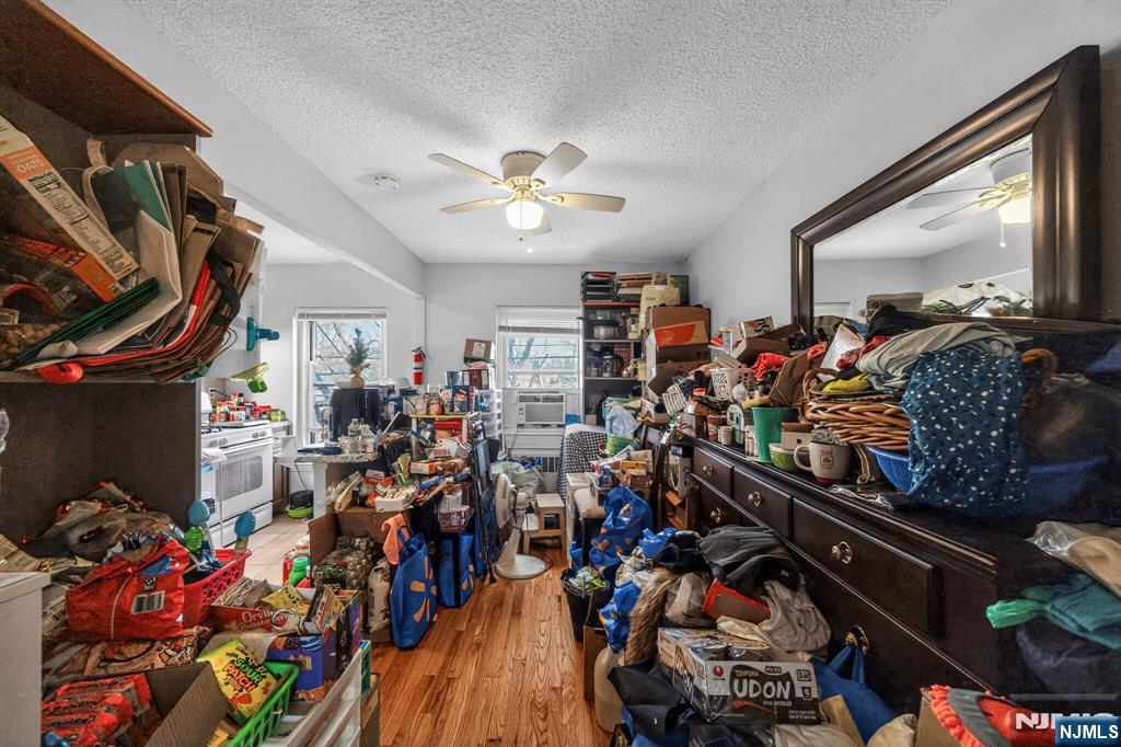 243 Johnson Avenue, Unit L4 Hackensack, NJ 07601 - Photo 6 of 25 a view of a room with lots of stuff