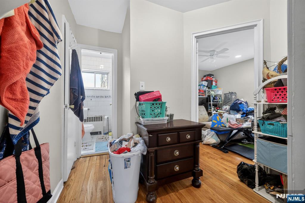243 Johnson Avenue, Unit L4 Hackensack, NJ 07601 - Photo 9 of 25 a view of a livingroom with furniture and toys