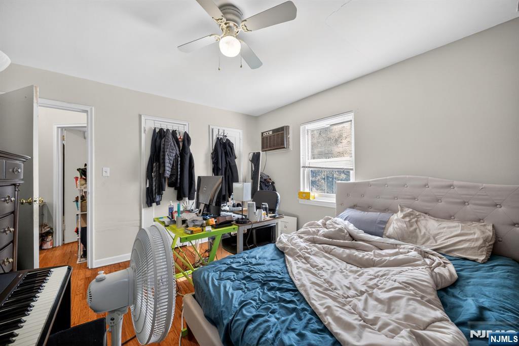 243 Johnson Avenue, Unit L4 Hackensack, NJ 07601 - Photo 10 of 25 a view of a livingroom with furniture and a ceiling fan