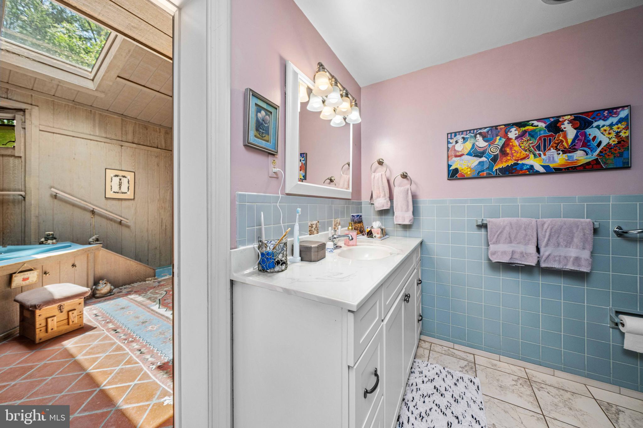 4614 Sylvanus Drive Wilmington, DE 19803 - Photo 35 of 48 a bathroom with a sink mirror and toilet