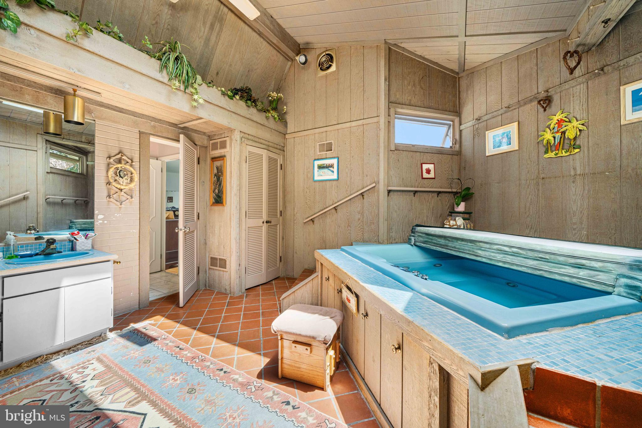 4614 Sylvanus Drive Wilmington, DE 19803 - Photo 38 of 48 a bathroom with a sink a mirror and a shower