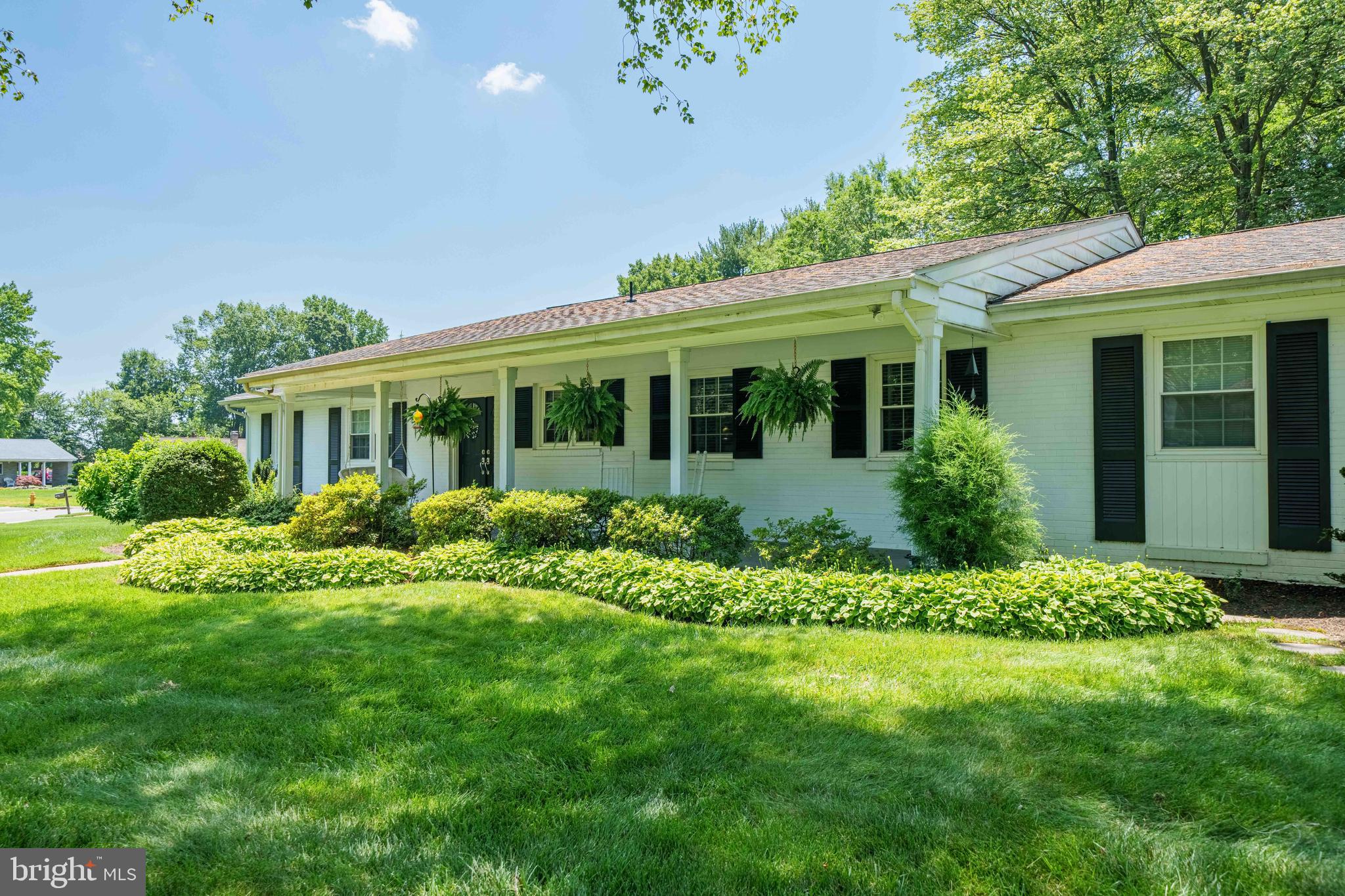 4614 Sylvanus Drive Wilmington, DE 19803 - Photo 8 of 48 a view of a house with a garden