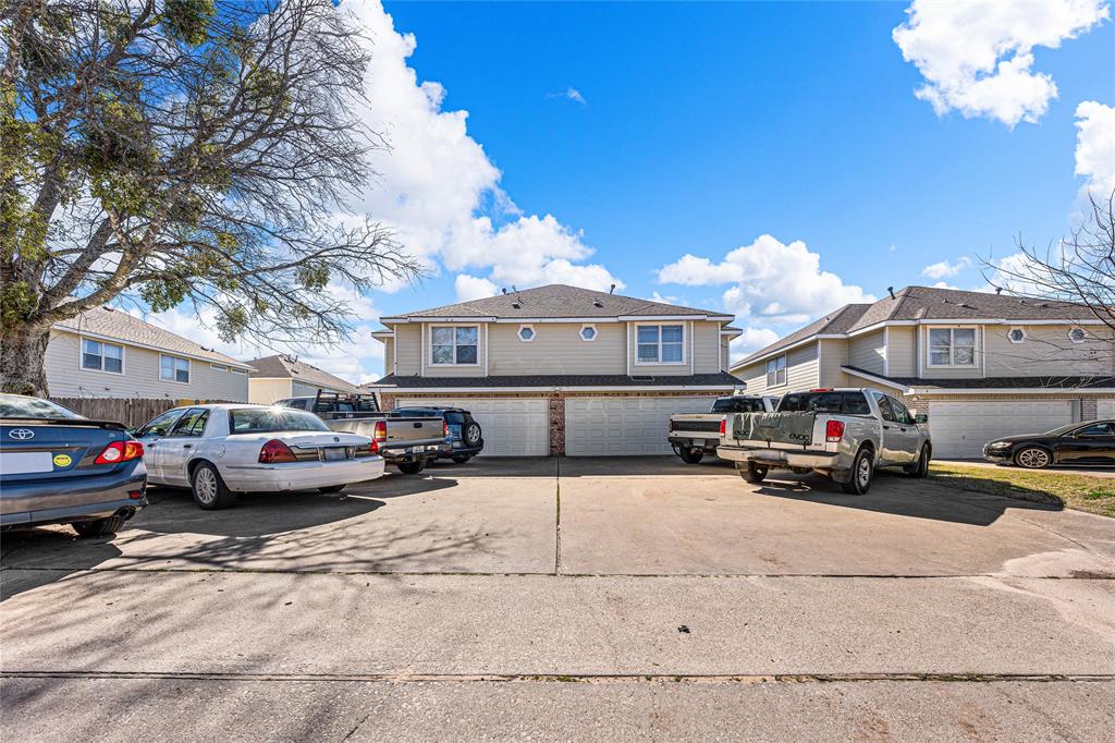 a view of street with parked cars