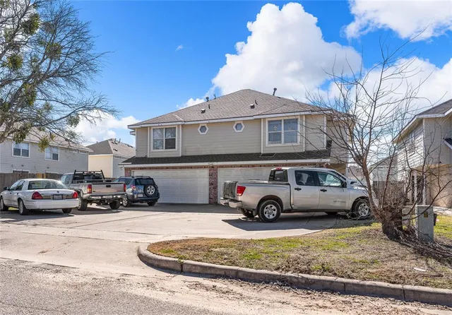 a car parked in front of a house