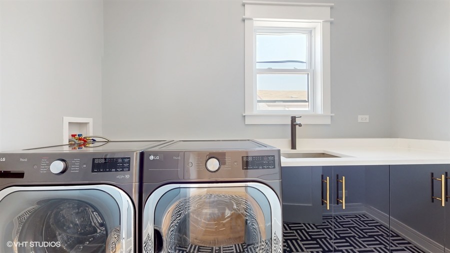 4115 North Ridgeway Avenue Chicago, IL 60618 - Photo 29 of 46 a utility room with two washing machine and sink