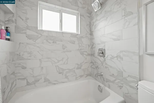 a bathroom with a bathtub