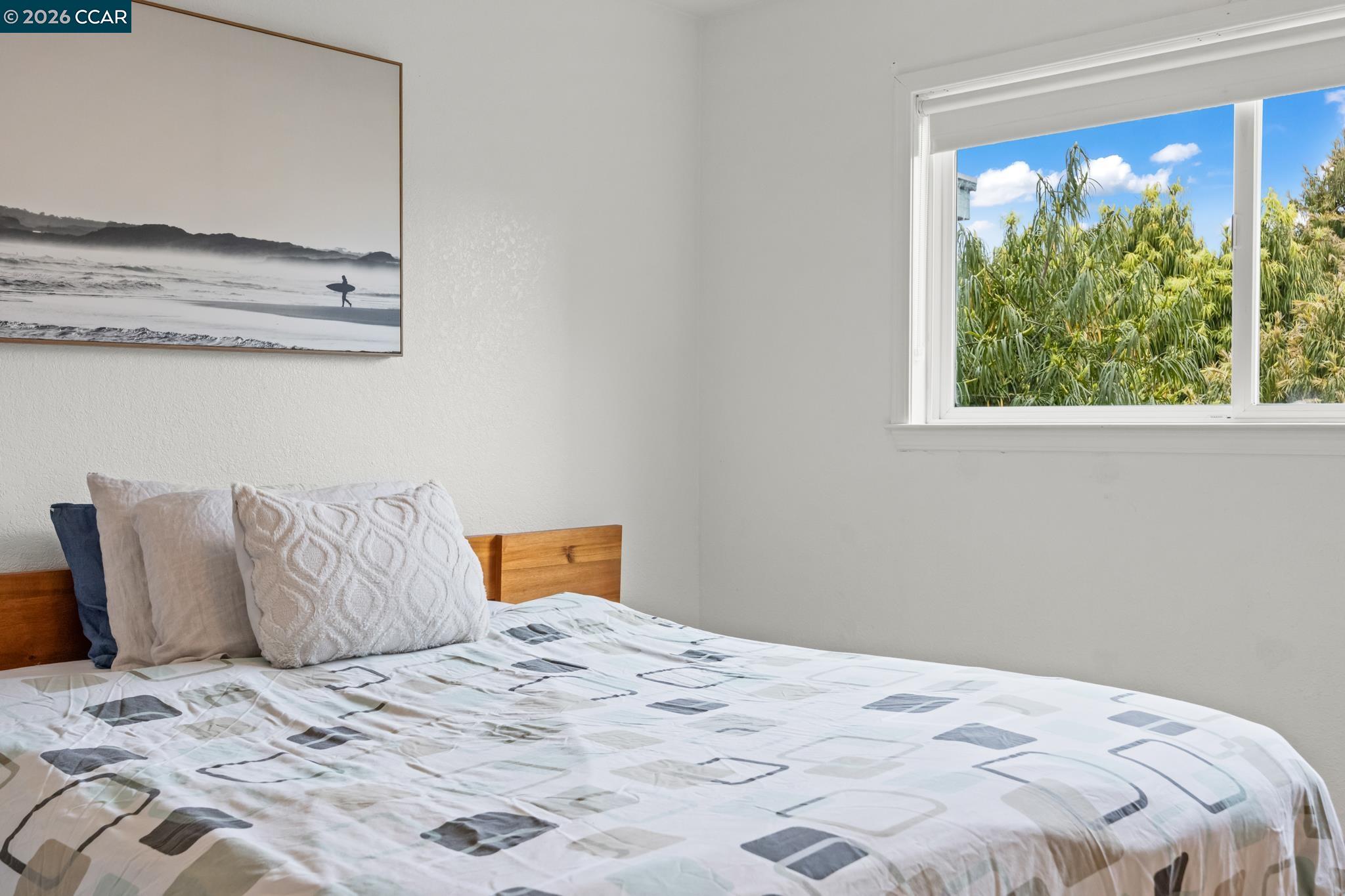 2327 Tenth Street, Unit 4 Berkeley, CA 94710 - Photo 22 of 39 a bedroom with a bed and a window