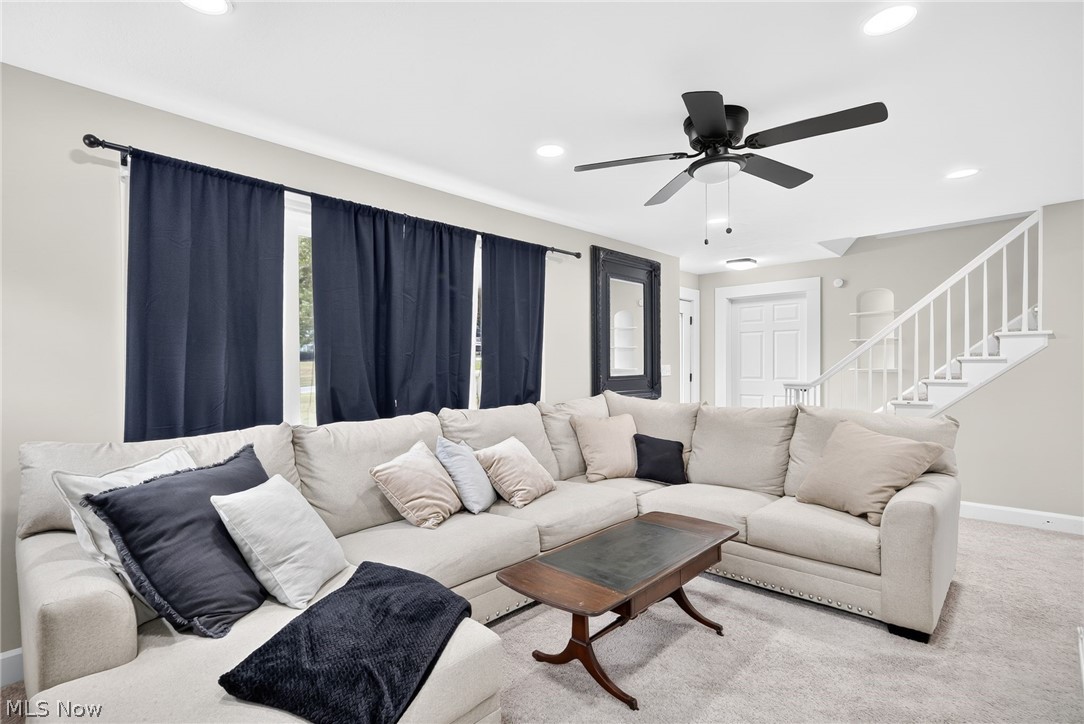 4824 Manchester Road Akron, OH 44319 - Photo 12 of 39 Light-filled living area featuring recessed lighting, a ceiling fan, and light-toned carpeting