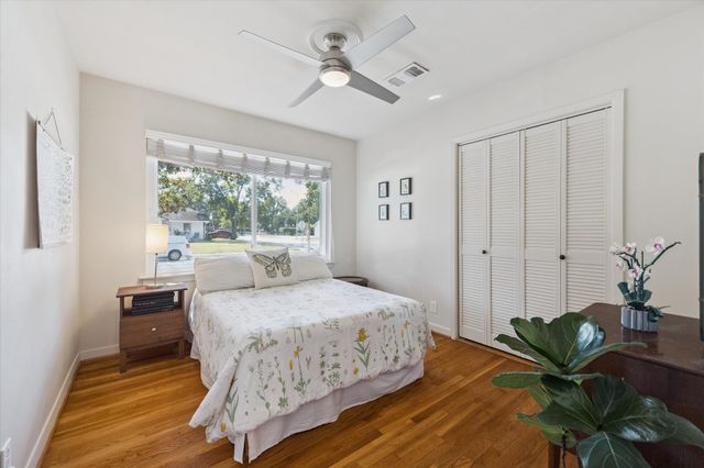 a bathroom with a sink toilet and mirror