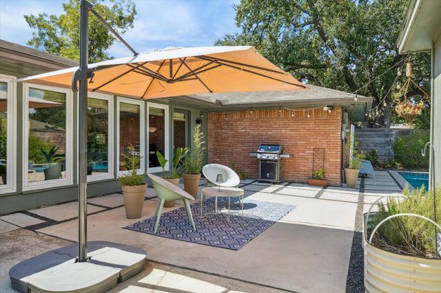 a living room with furniture and a projector
