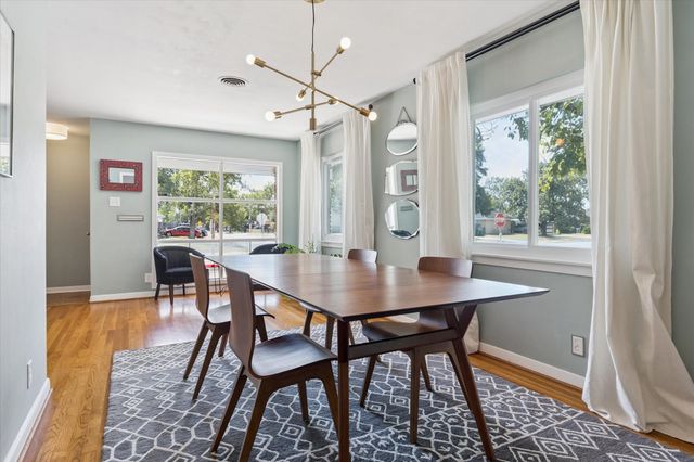 a view of a livingroom and dining room