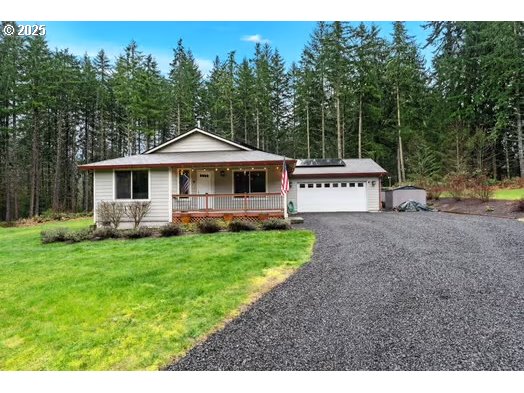 76500 Delena Mayger Road Rainier, OR 97048 - Photo 17 of 24 a front view of a house with garden