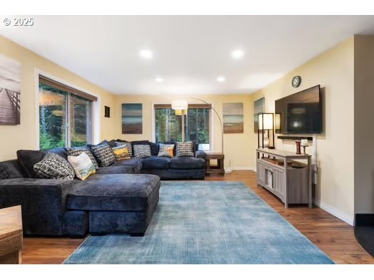76500 Delena Mayger Road Rainier, OR 97048 - Photo 2 of 24 a living room with furniture and a flat screen tv
