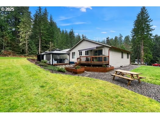 76500 Delena Mayger Road Rainier, OR 97048 - Photo 21 of 24 a swimming pool view with a seating space and a garden