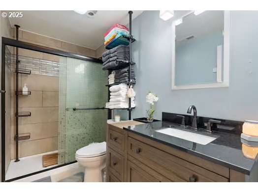 76500 Delena Mayger Road Rainier, OR 97048 - Photo 10 of 24 a bathroom with a granite countertop sink toilet and shower